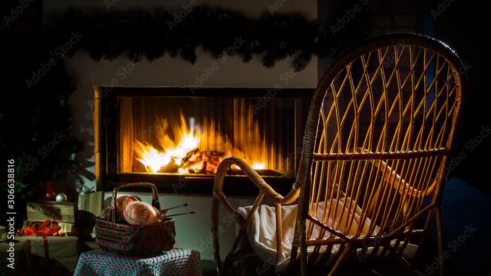 empty chair in front of a fireplace